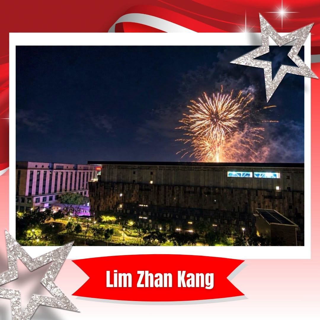 Fireworks over building complex by Lim Zhan Kang