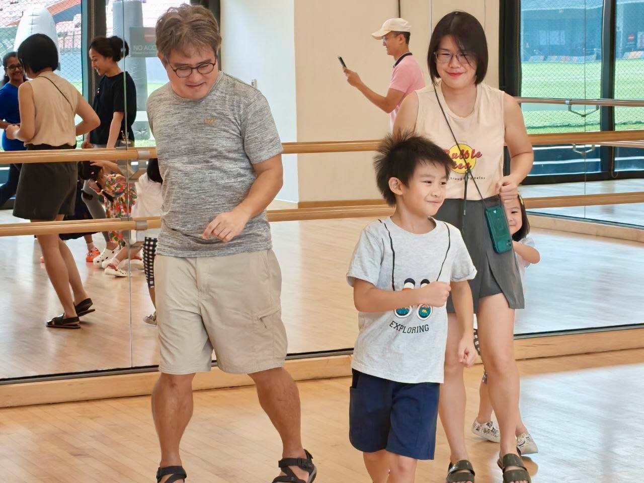 Families participating in the drama workshop