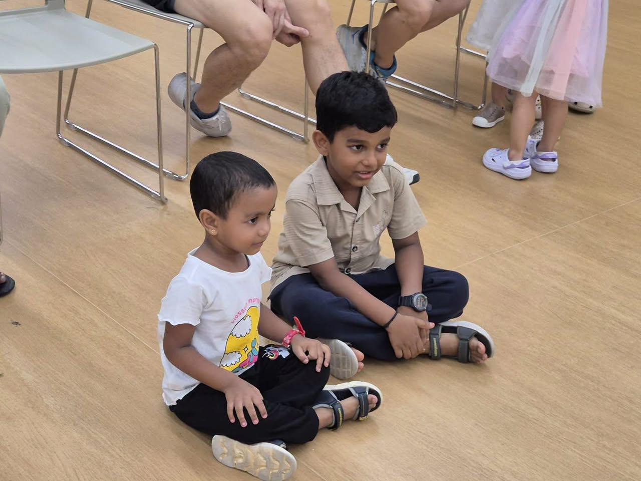 Children seated on floor during storytelling event at Our Tampines Hub