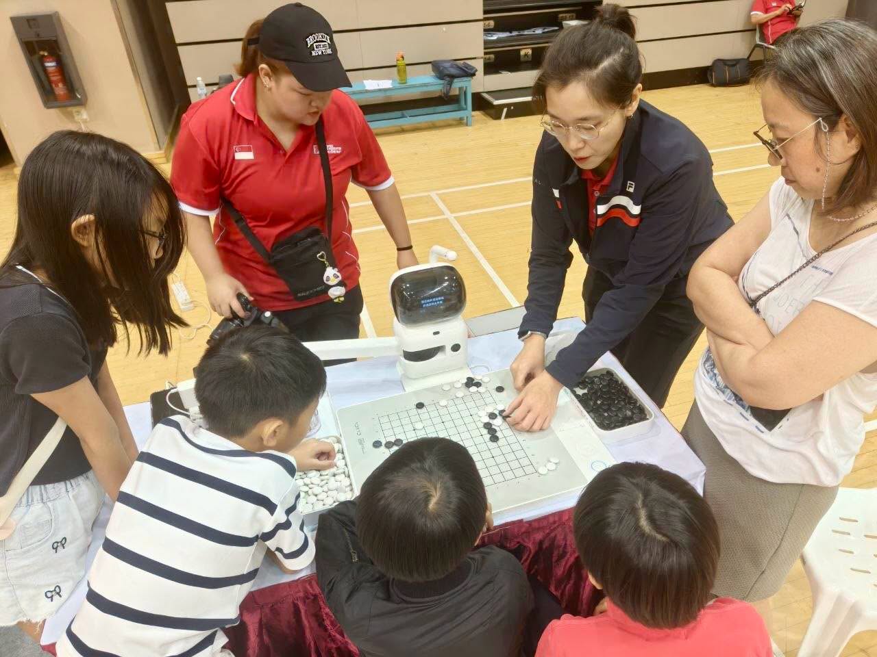 Staff teaching Go to children