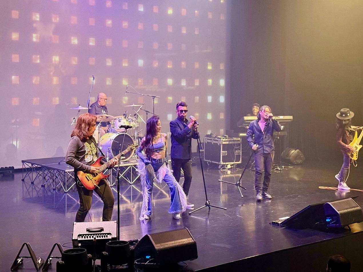 Musician performing live at Festive Arts Theatre