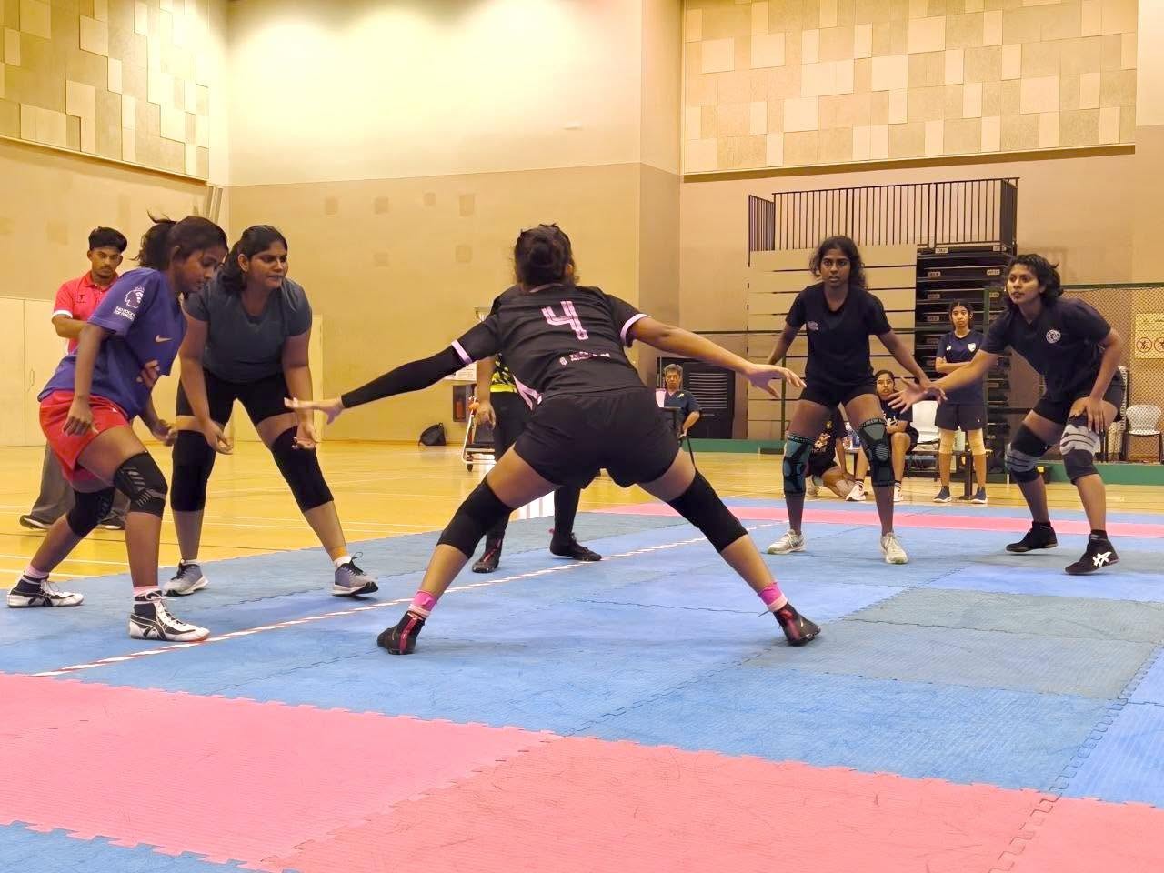 Athletes demonstrating teamwork during the championship