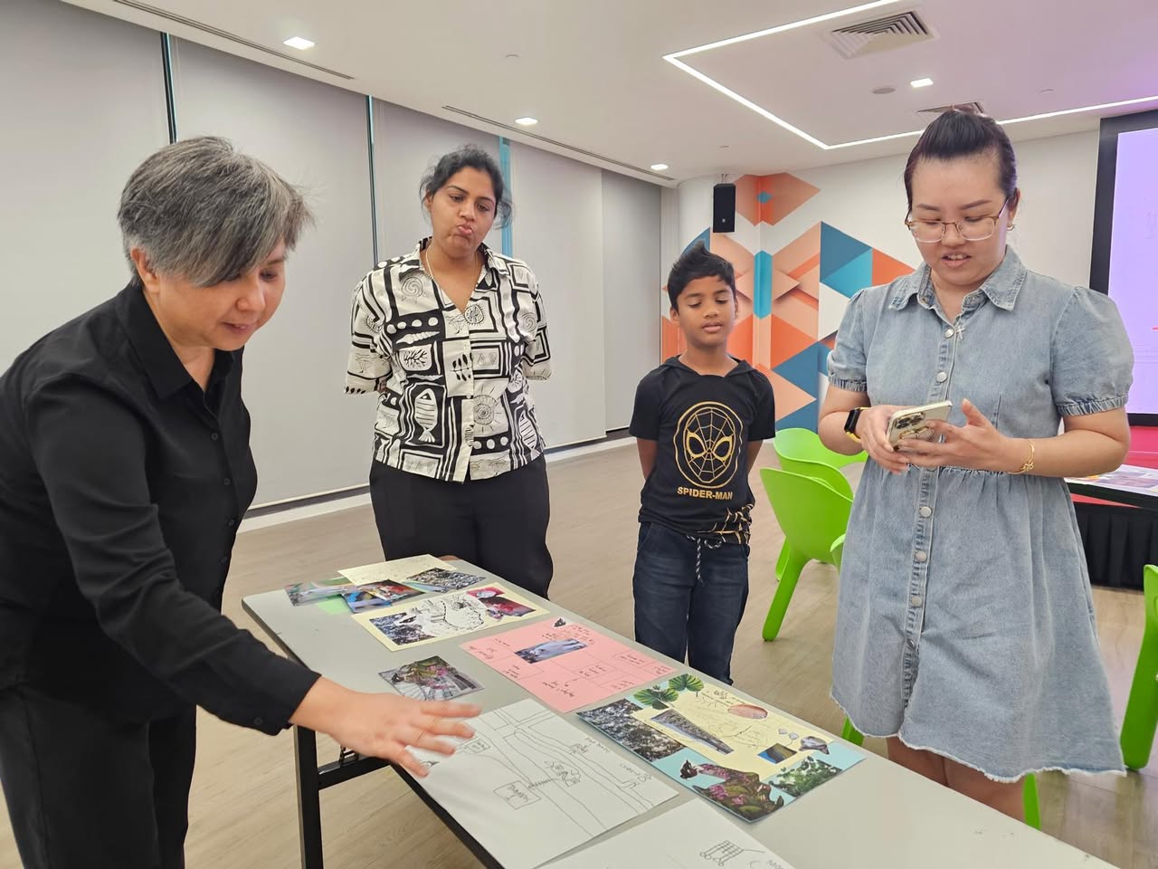 A speaker leading a workshop discussion at Our Tampines Hub