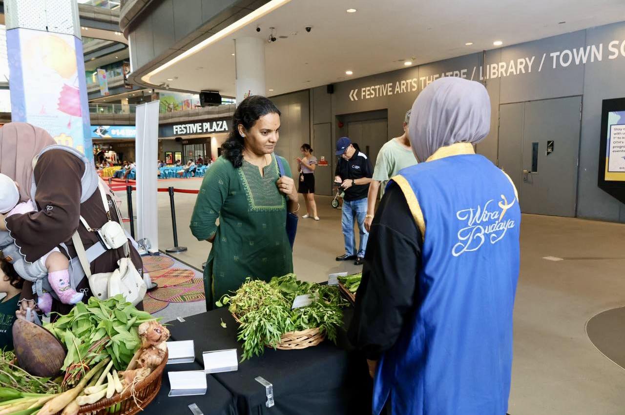 Vibrant scenes from the Bulan Bahasa 2025 celebration at Our Tampines Hub
