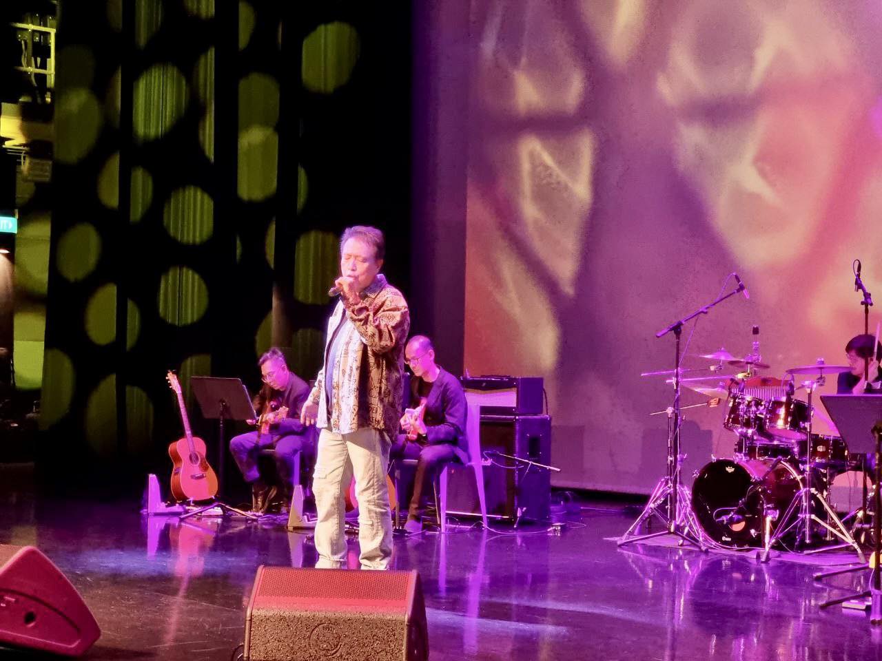 Musicians on stage at Our Tampines Hub's Festive Arts Theatre