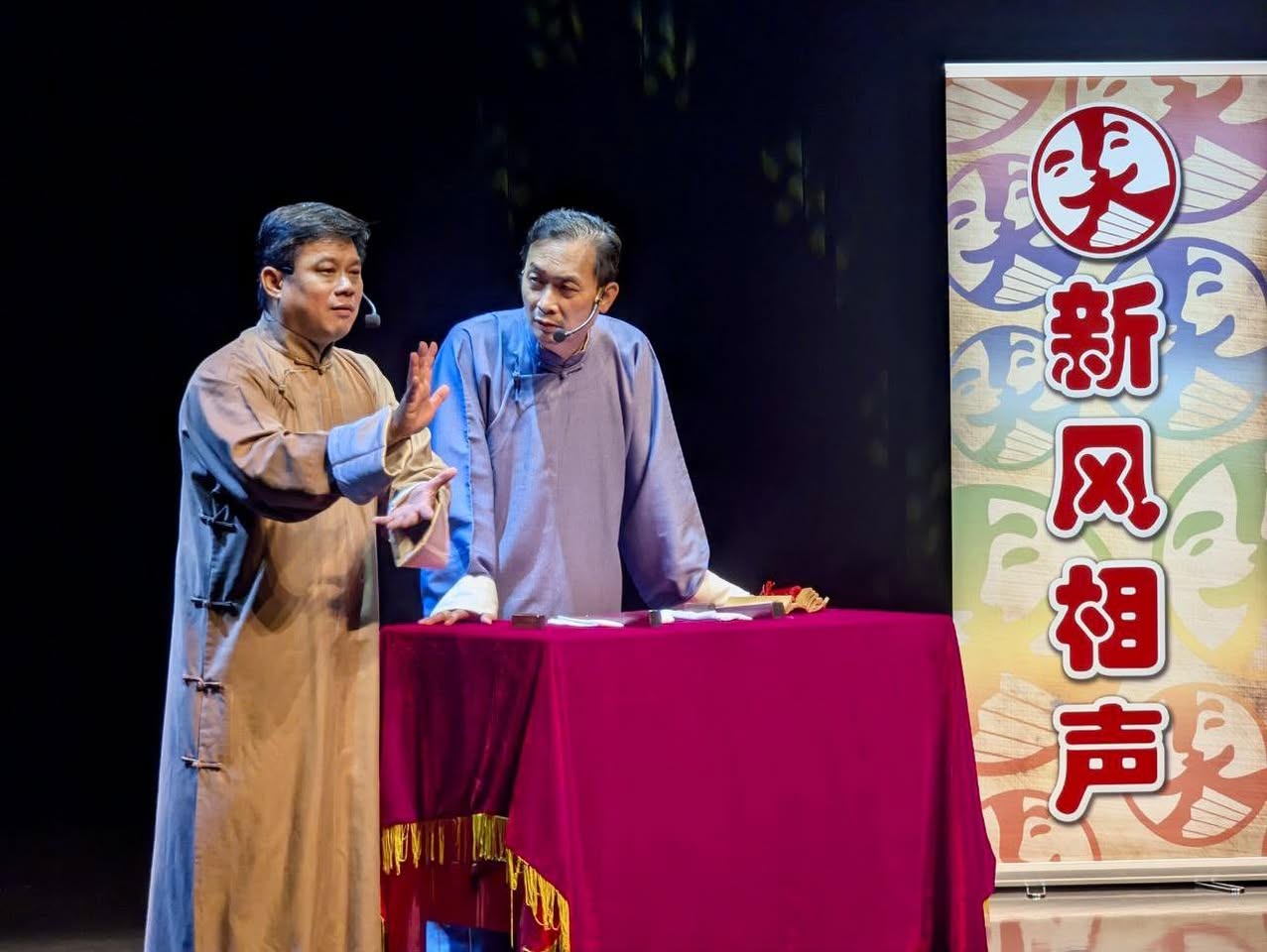 Crosstalk artistes interacting with the crowd during their act