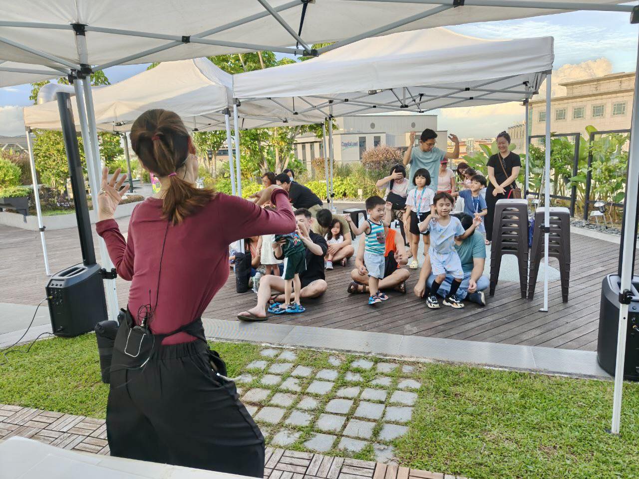 Children and parents enjoying a fairytale at OTH Wellness Garden