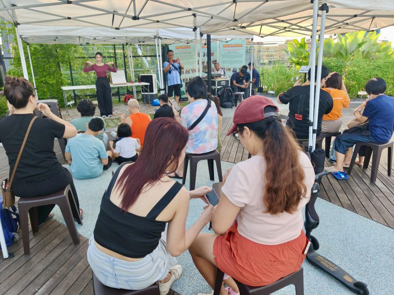 Storyteller captivating an audience with 'Emperor & The Nightingale'