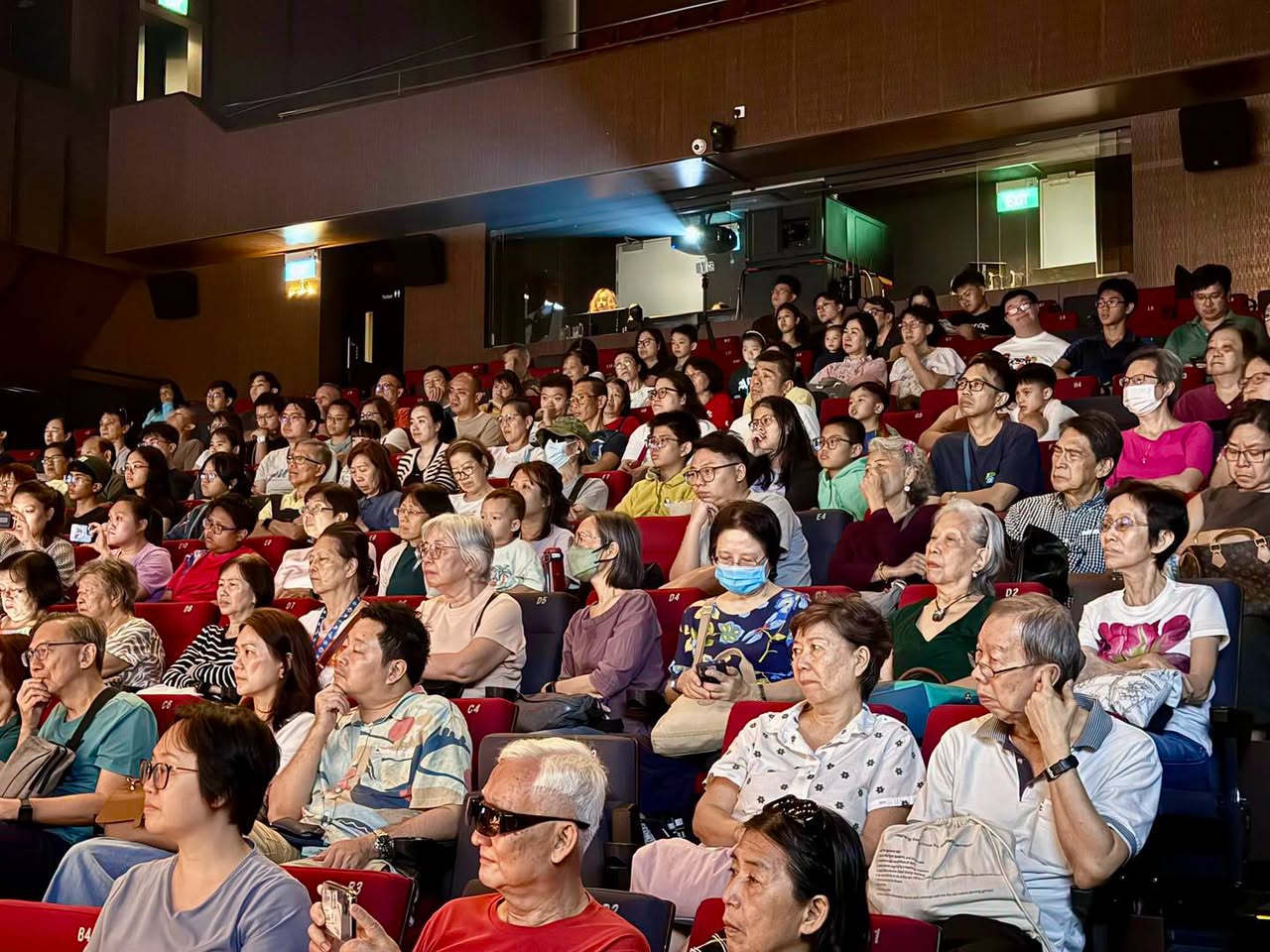 Audience seated at The Festive Arts Theatre for the clarinet performance