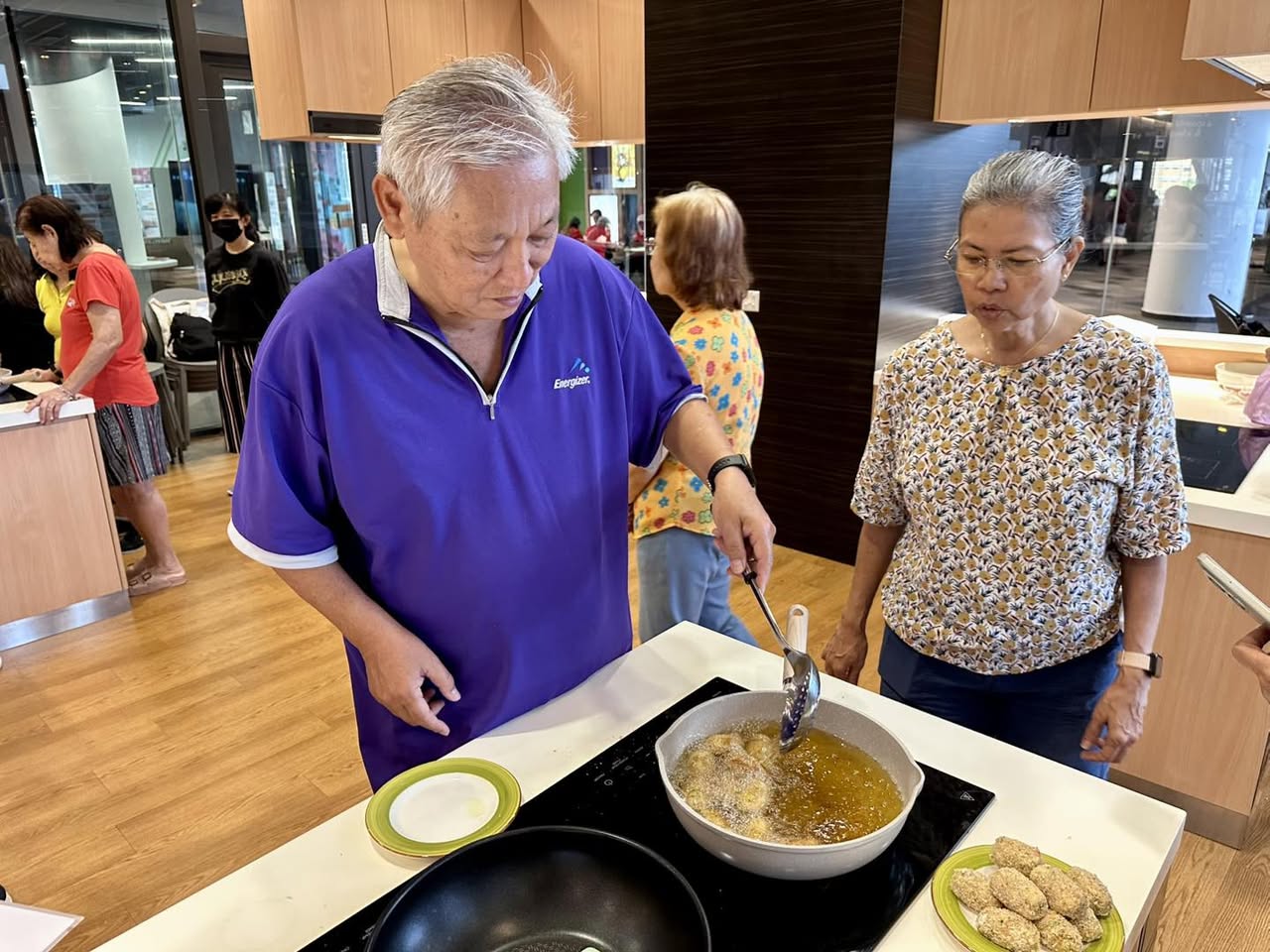 Delicious chicken croquettes being fried to golden perfection