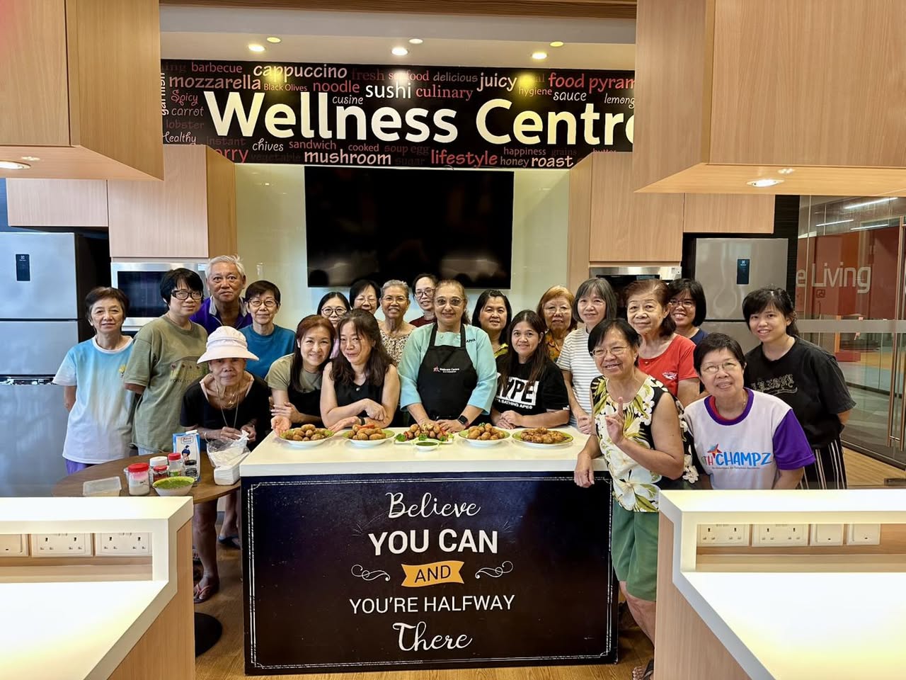 Happy participants showcasing their freshly made chicken croquettes
