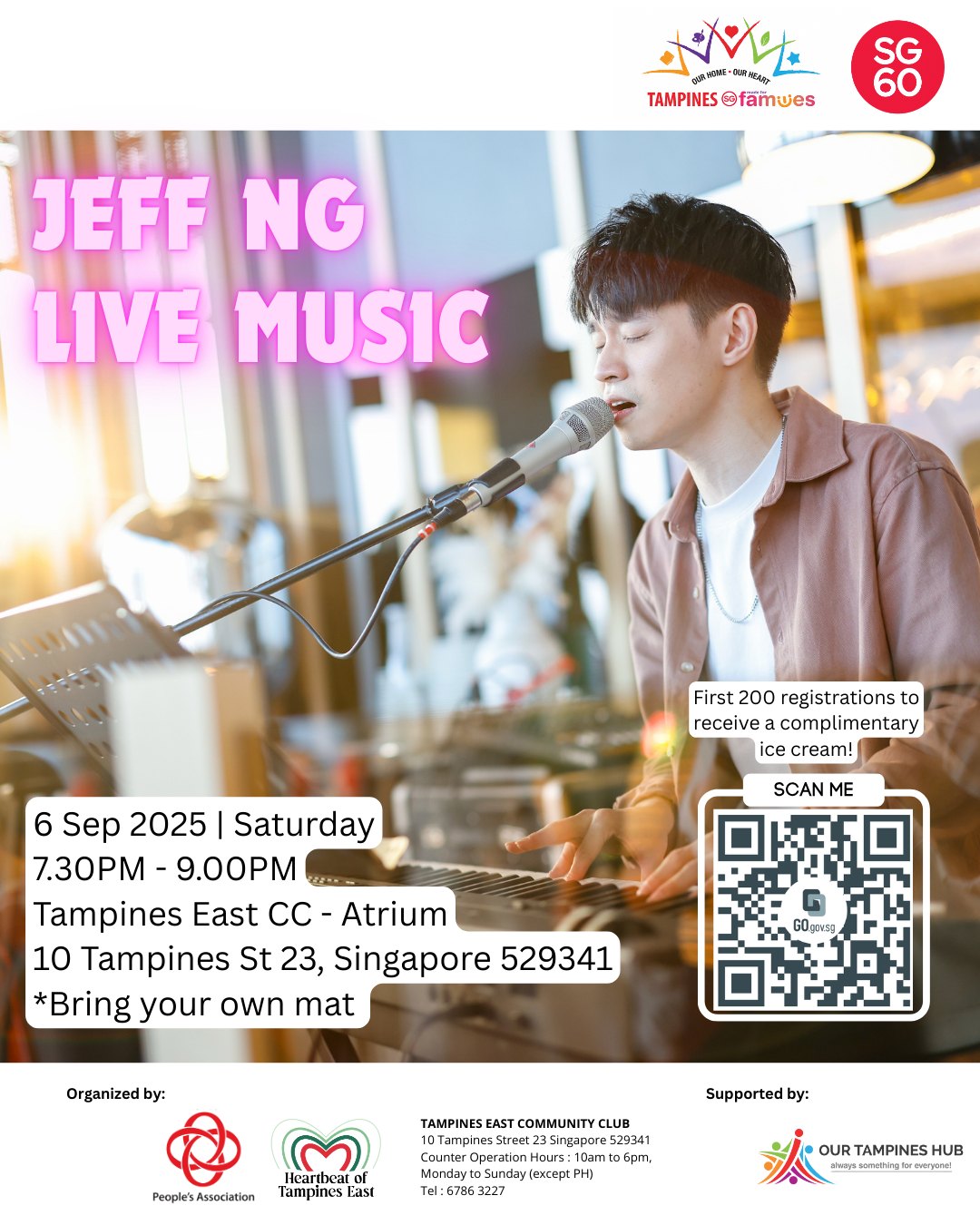 Jeff Ng performing live on stage at a community event