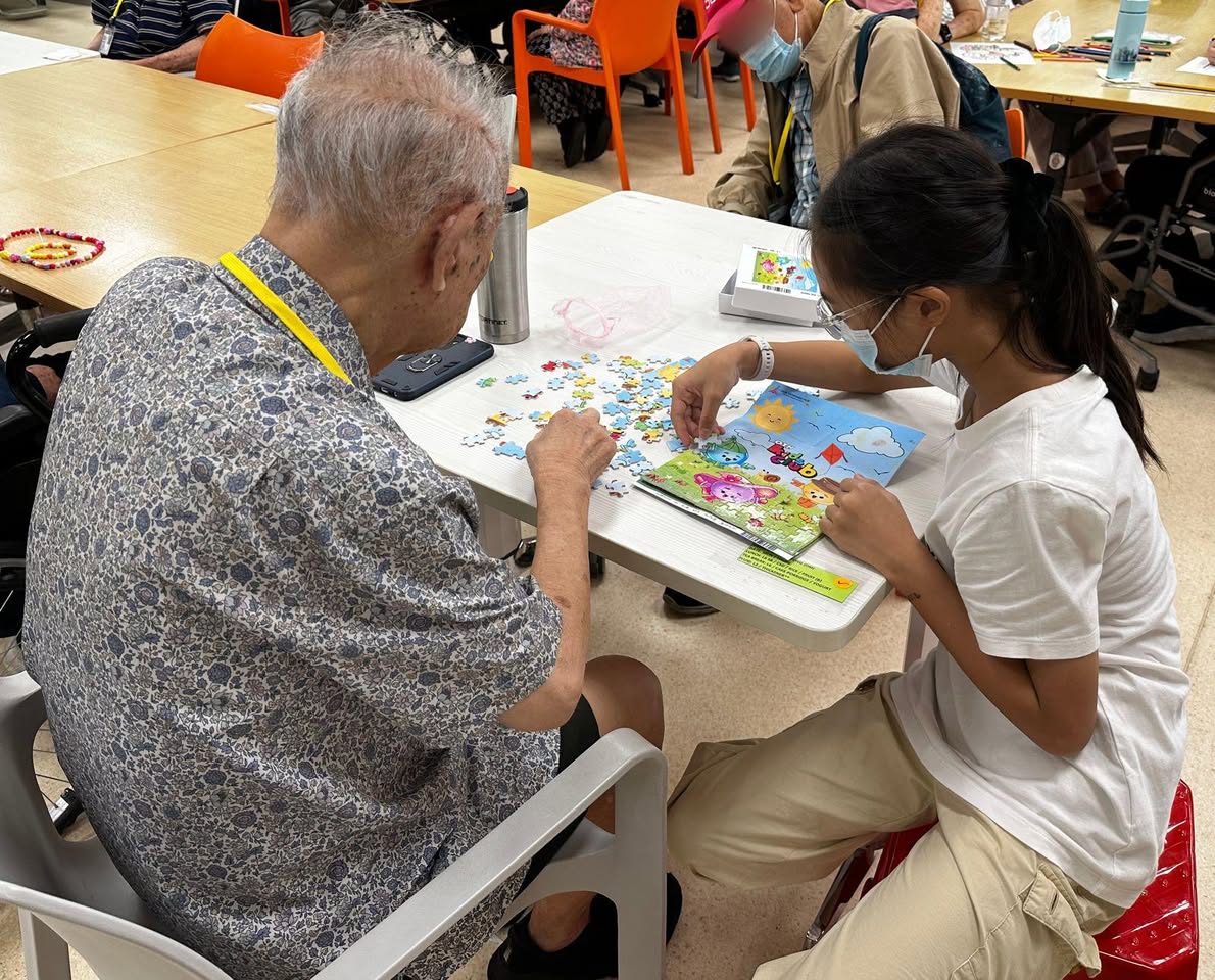 Volunteers and seniors during group activities