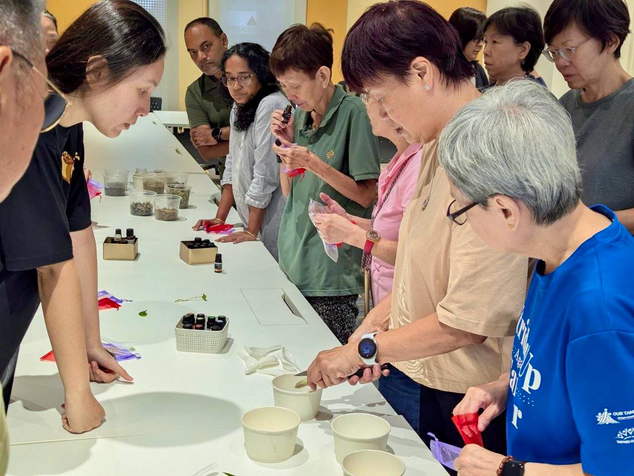 Workshop participants mixing and labeling samples