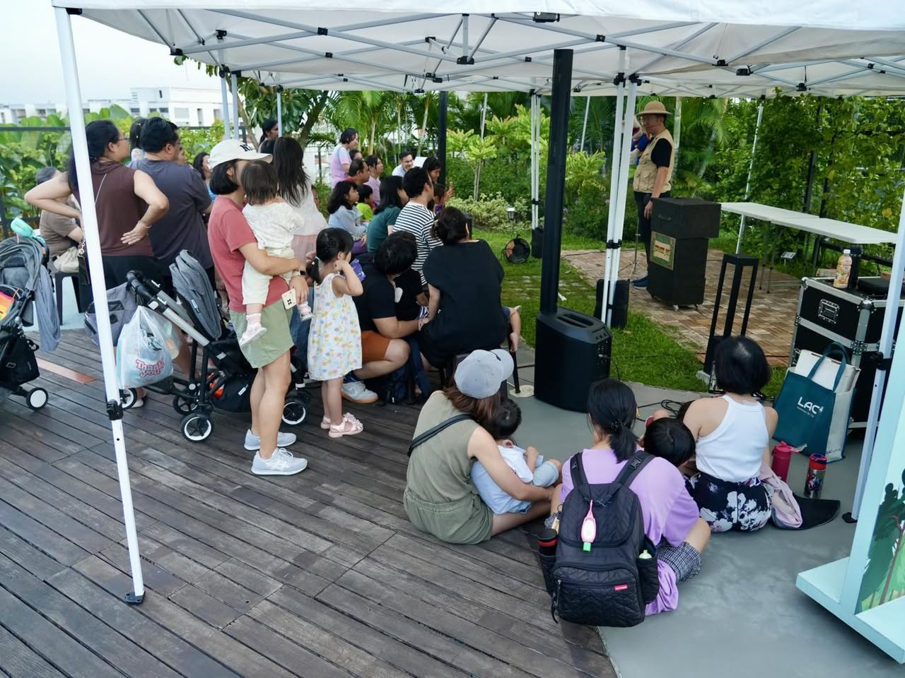 Attendees enjoying a moment of laughter during the show