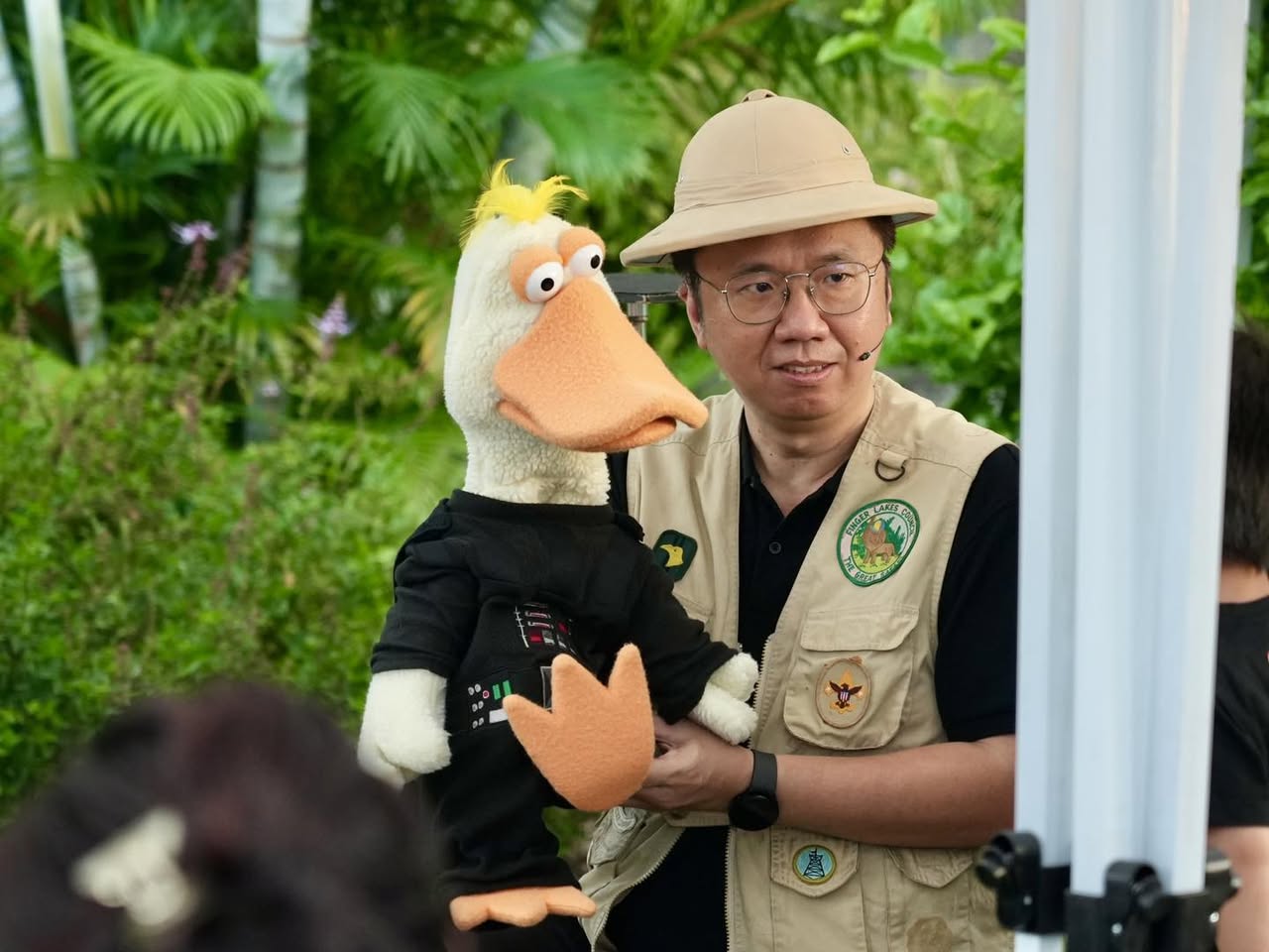 Magician Tommy captivating the audience with an illusion