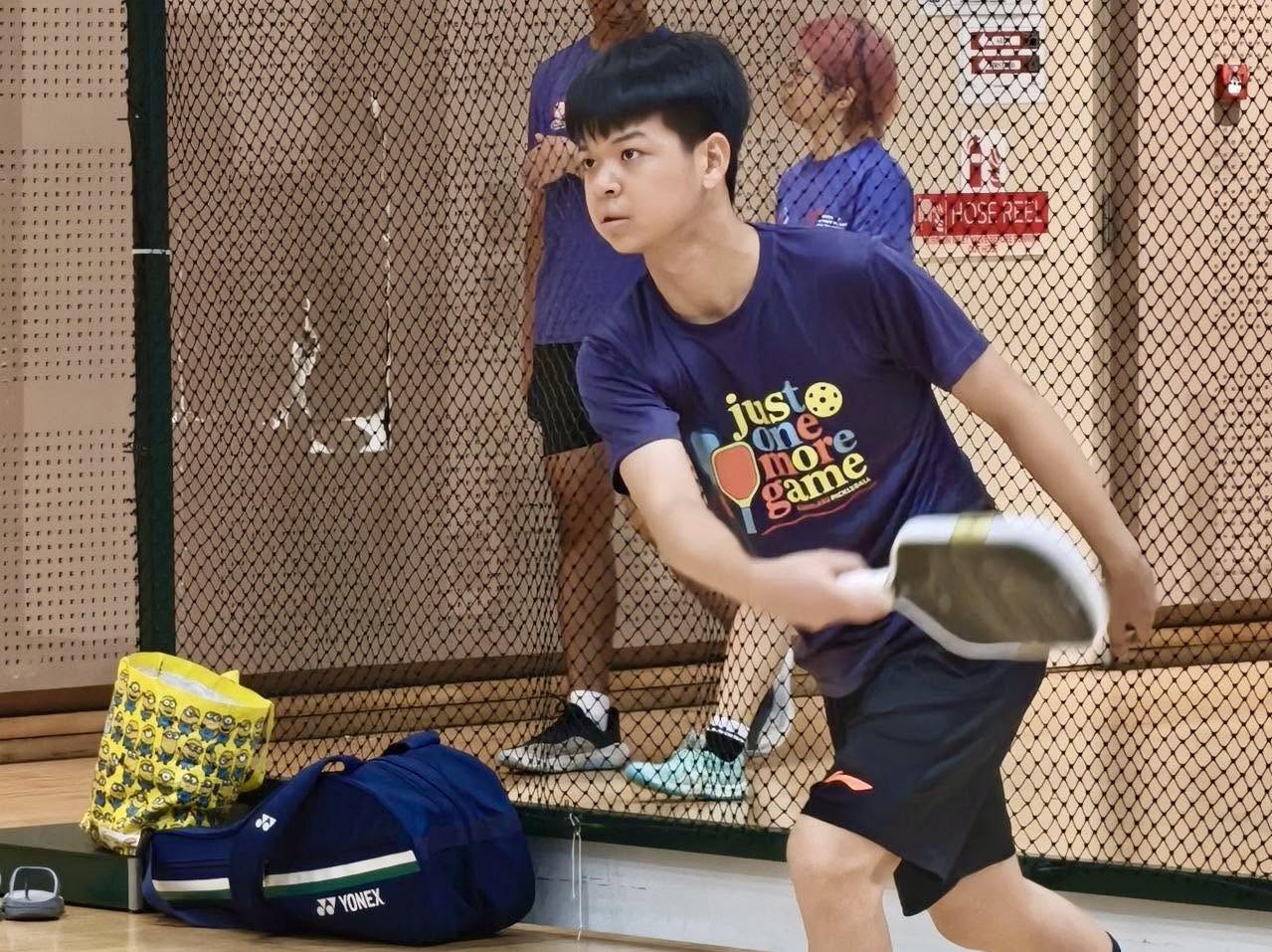 Participants at the OTH Cross Rackets Championship with sports equipment