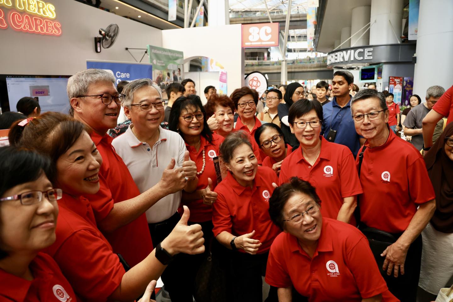 Attendees exploring various booths and activities at Our Tampines Hub