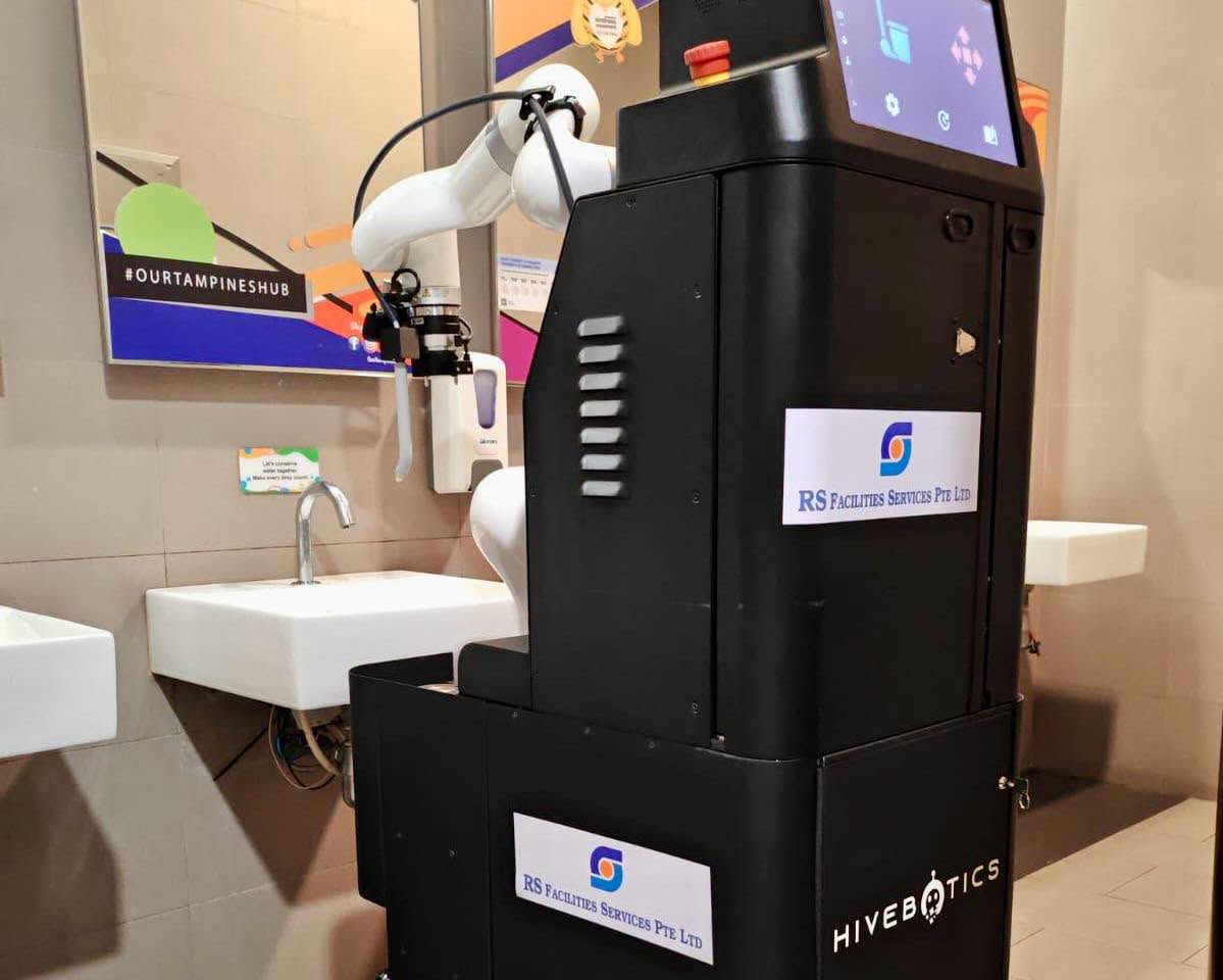 HiveBotics robotic hand sanitizer dispenser with touchscreen