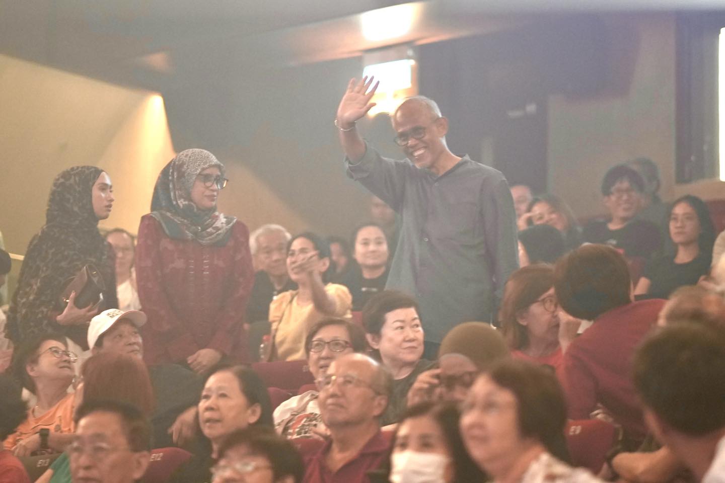 Audience members enjoying the live music at 'Let's Rock! SG Rock'