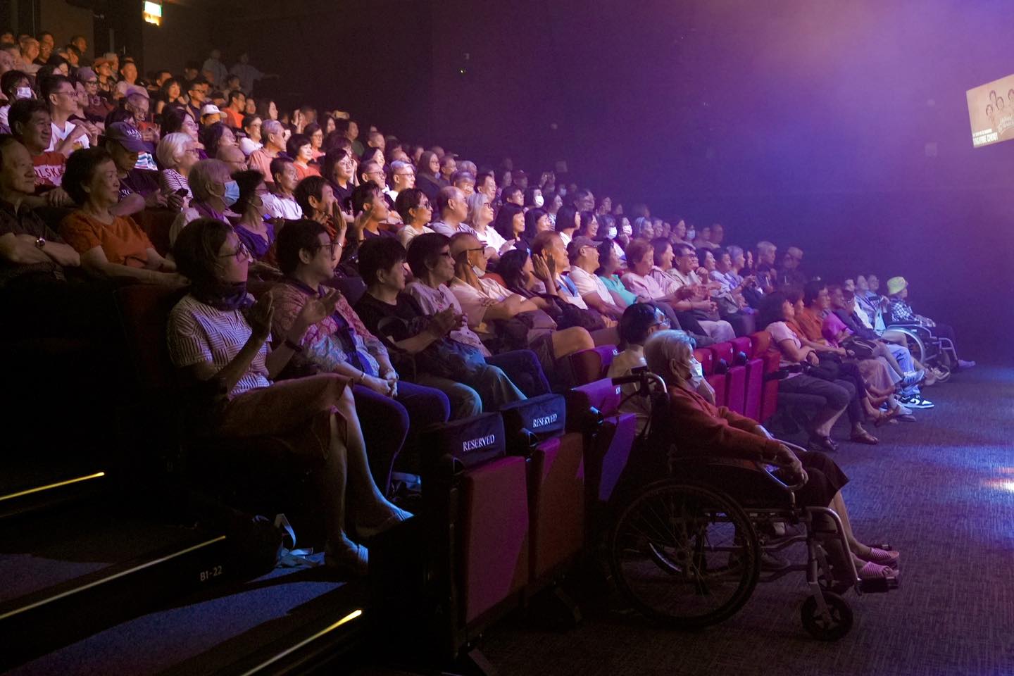 Vibrant crowd cheering at 'Let's Rock! SG Rock' concert