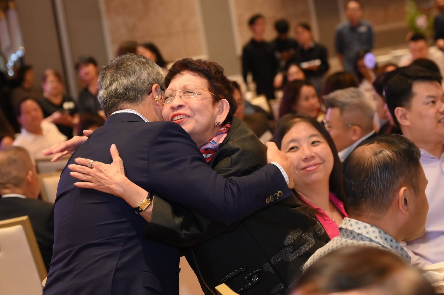 Community leaders and partners interacting at the awards event.