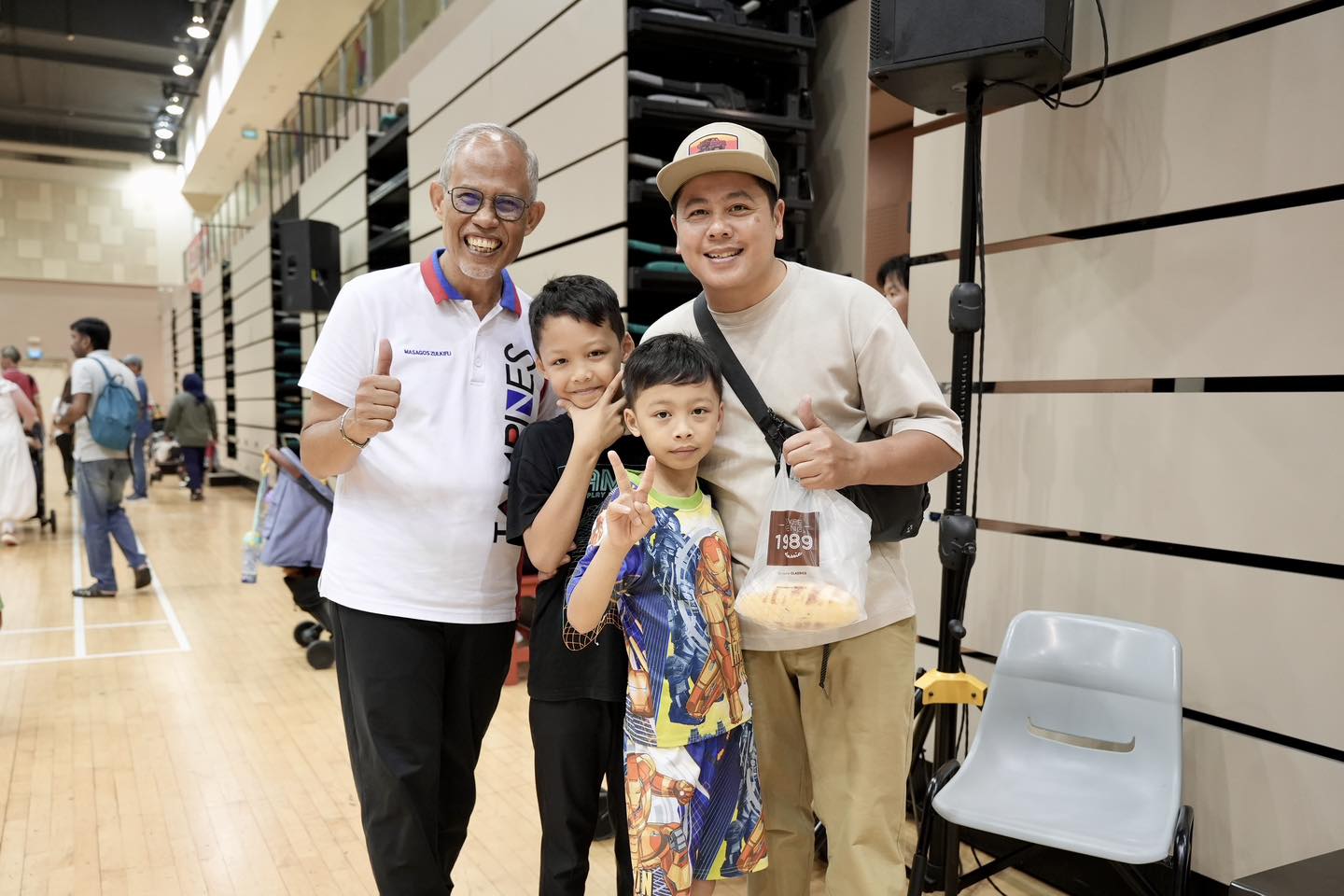 Families cheering on children during a game at the Tampines Sports Carnival