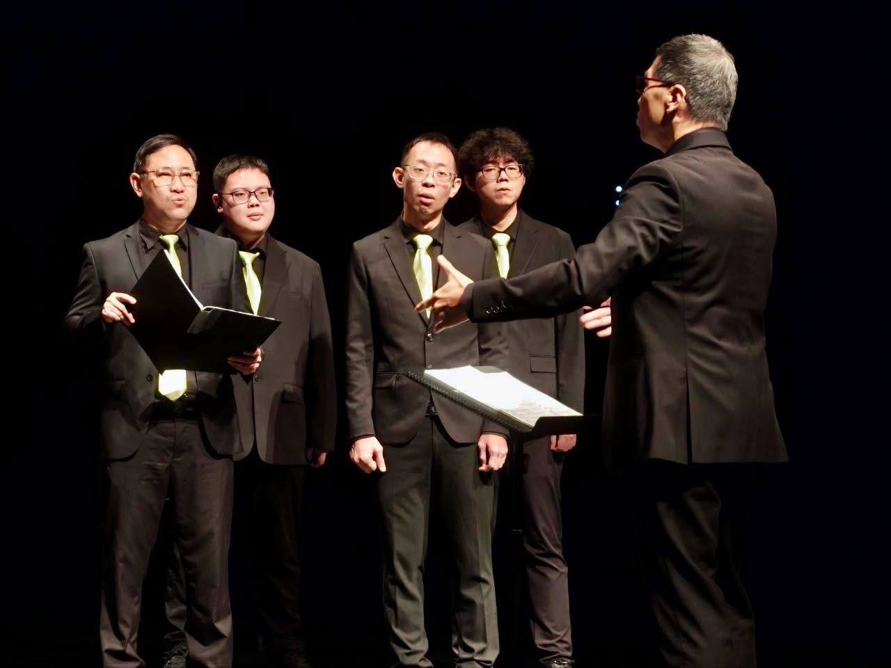 Male vocal ensemble performing at Festive Arts Theatre
