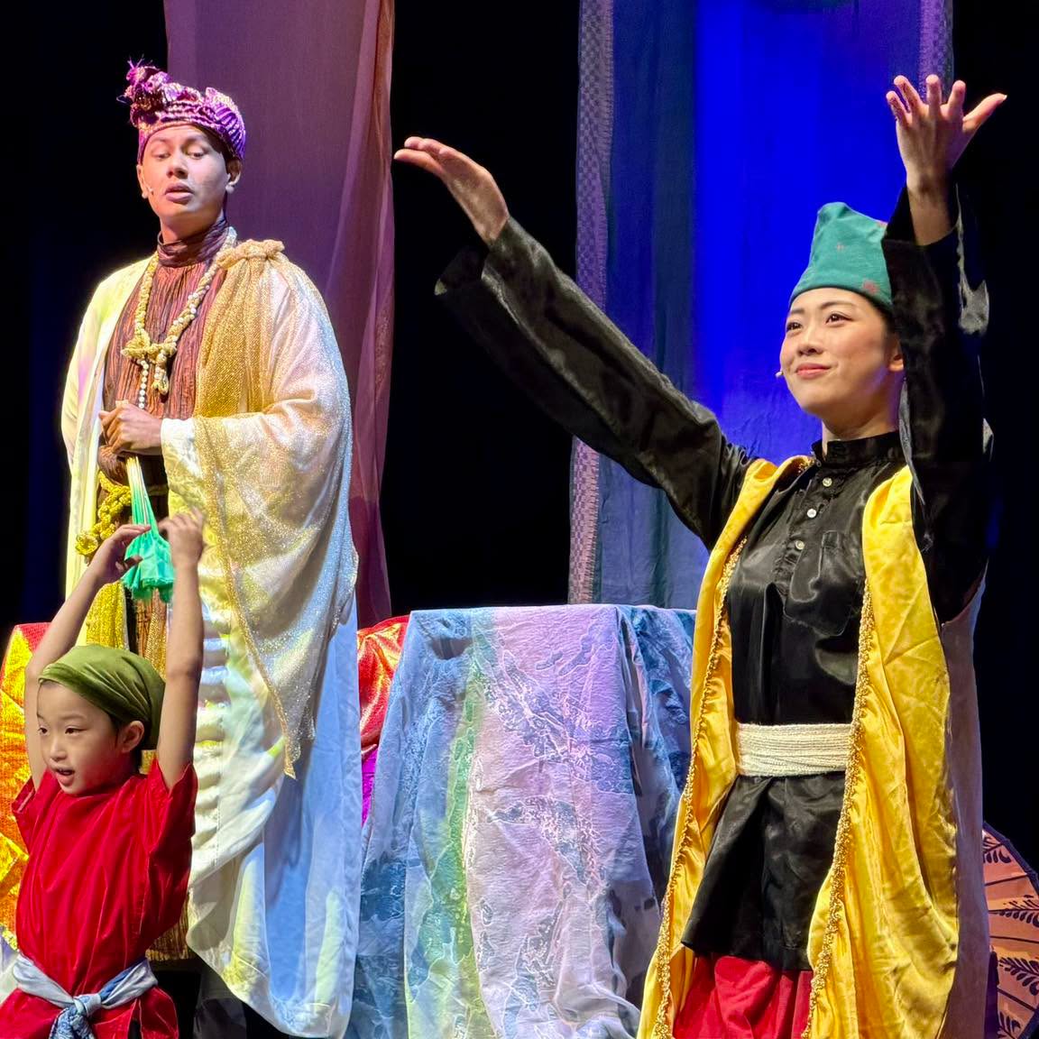 Actors in traditional attire performing in The Nightingale
