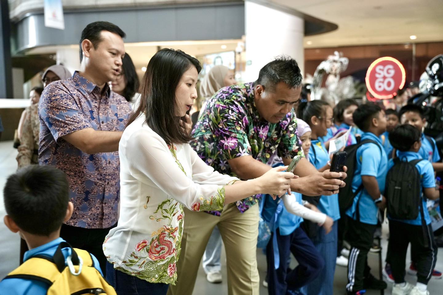 An overview shot of the vibrant Raikan Ilmu festival at Our Tampines Hub.