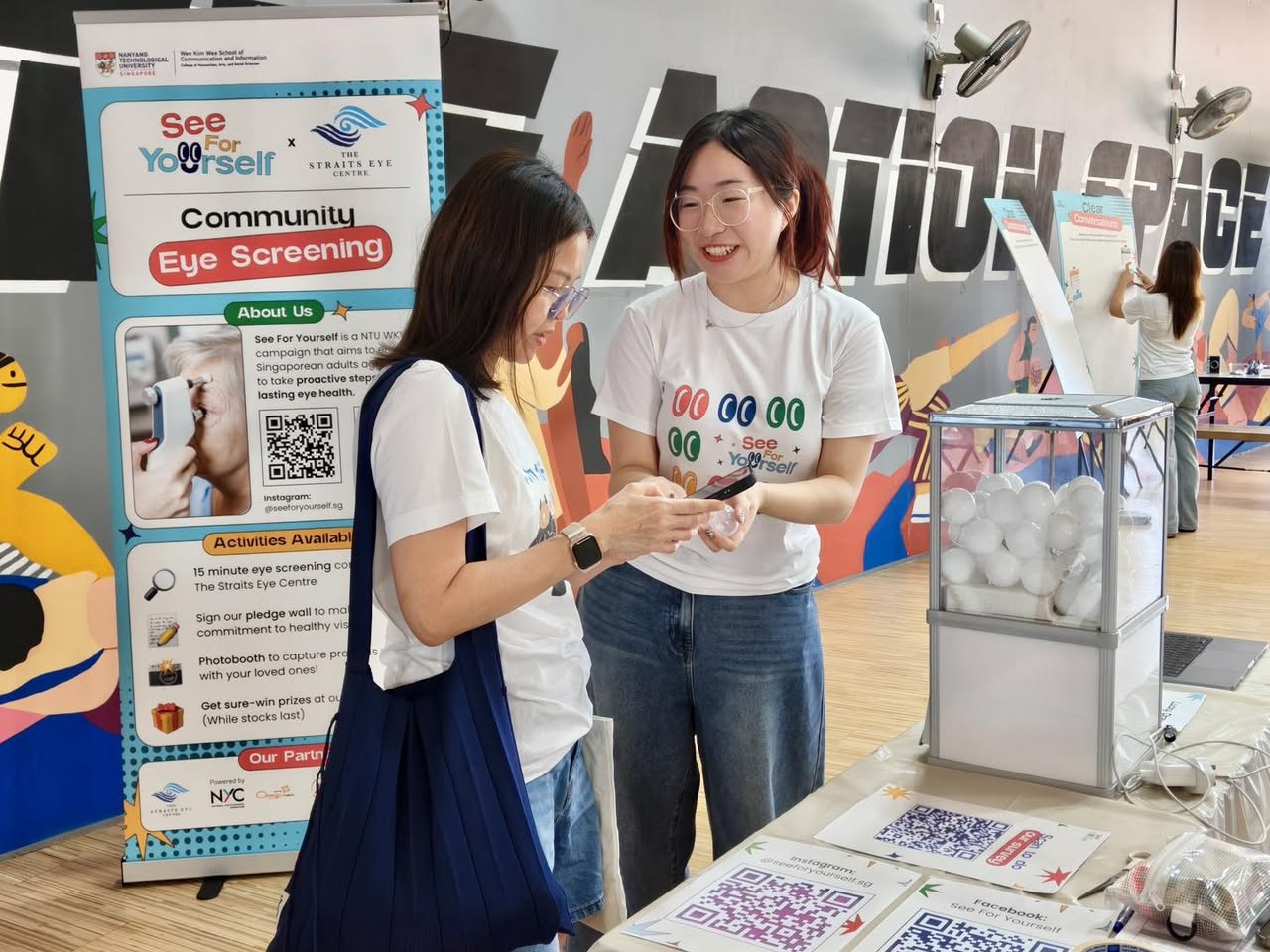 NTU students and staff engaging with residents during the event