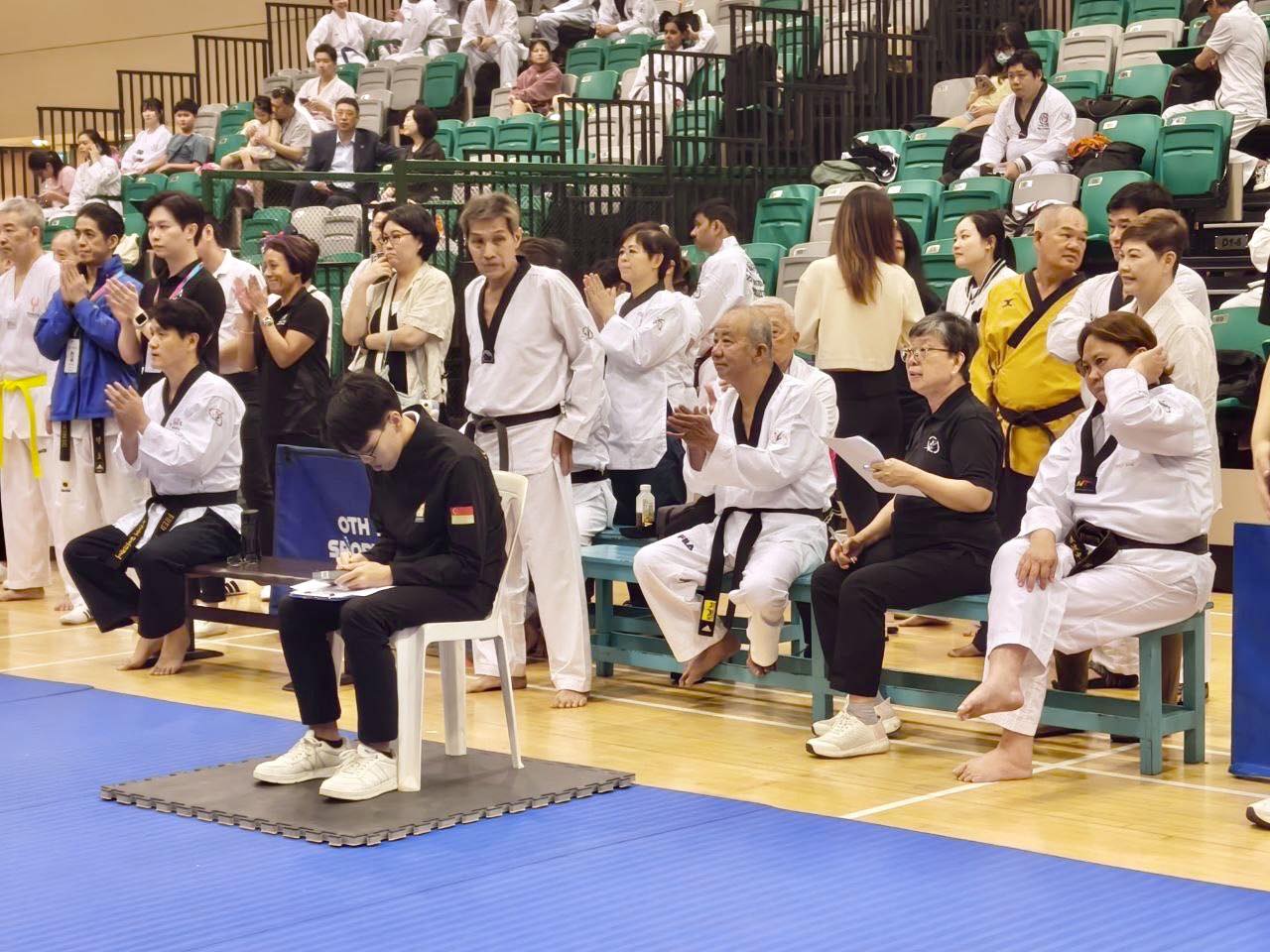 A taekwondo practitioner demonstrating a poomsae form