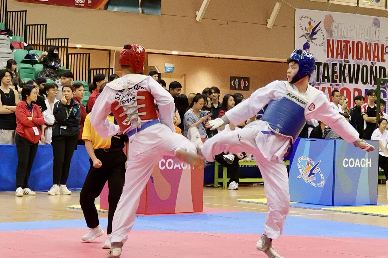 Award ceremony with winners and dignitaries at the Taekwondo event