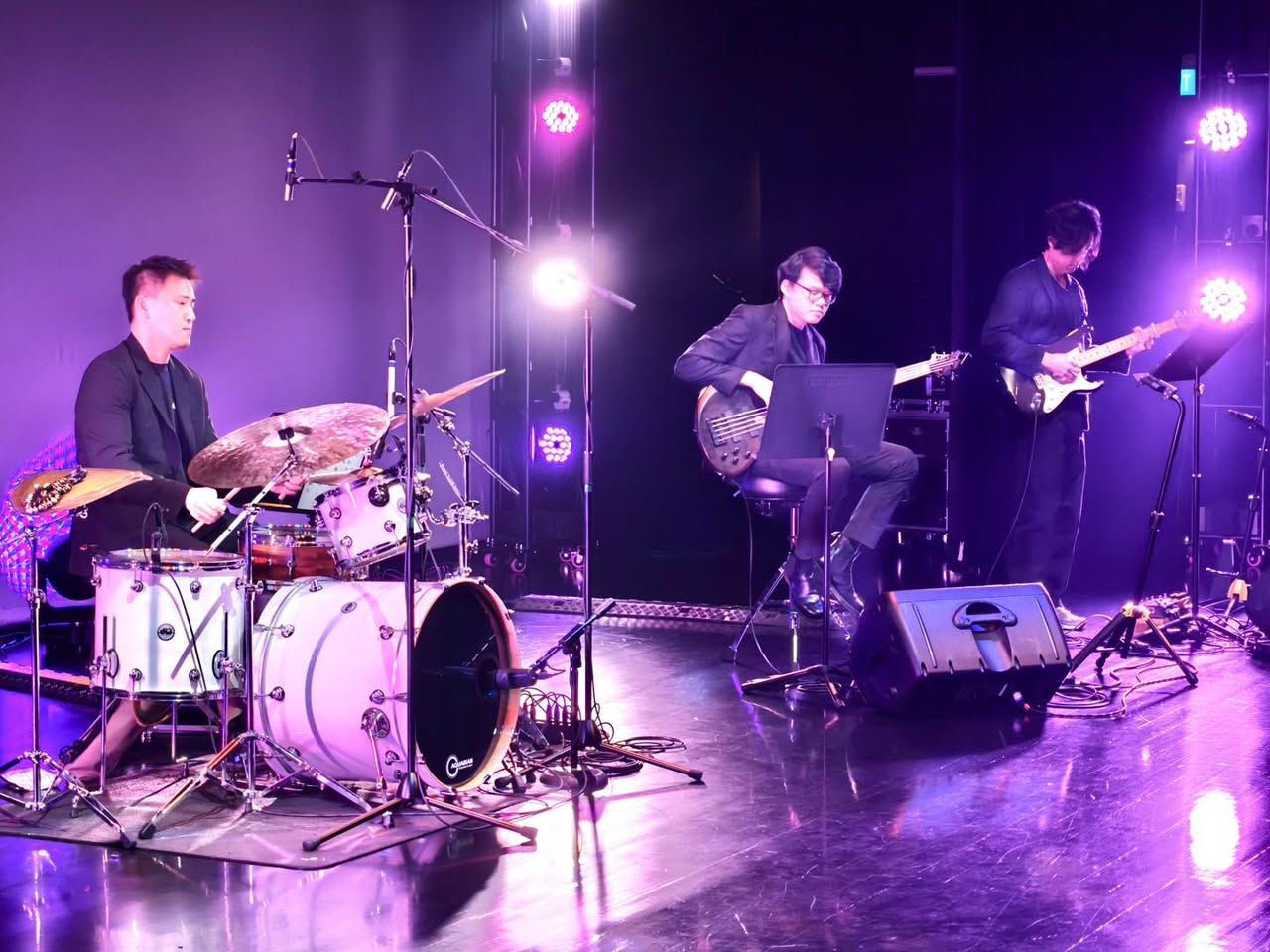 Close-up of Daniel Chia passionately playing his saxophone