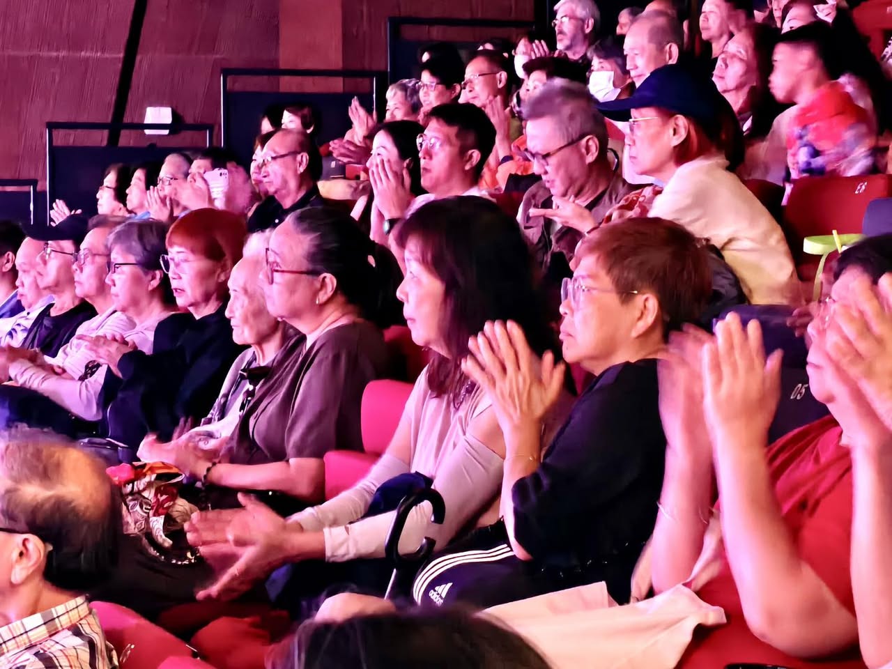 Daniel Chia performing saxophone on stage at Festive Arts Theatre
