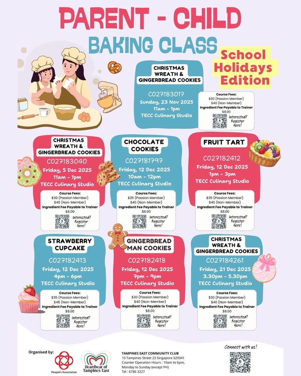 A parent and child sharing a joyful moment while decorating festive gingerbread cookies.