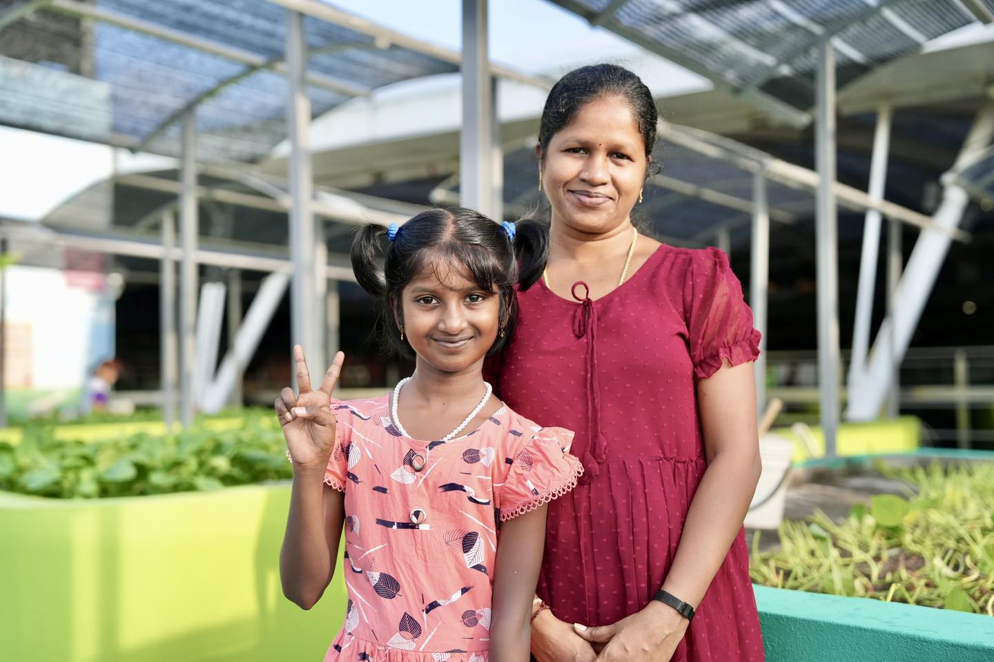 OTH Champz volunteers guiding residents during the harvesting process.