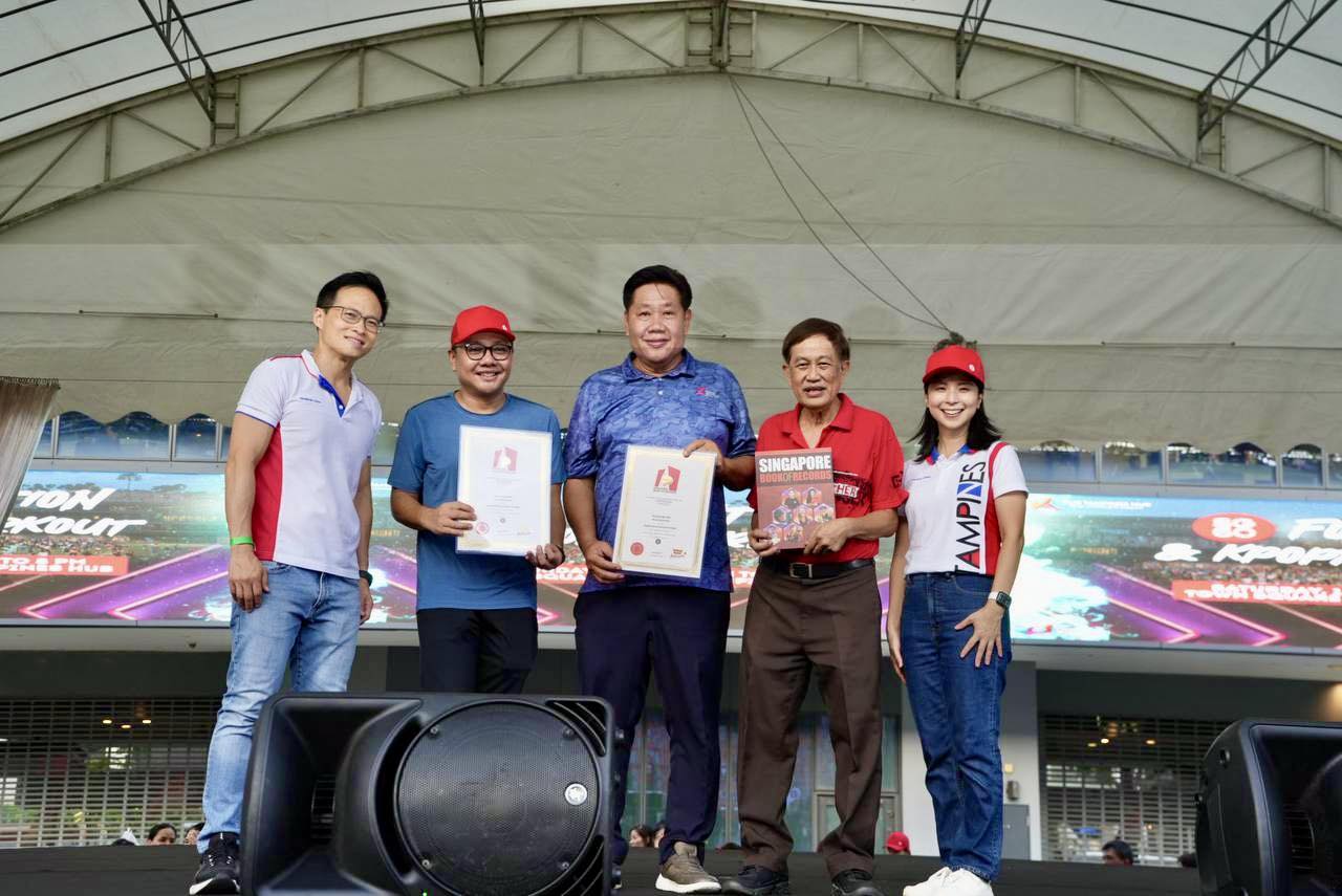 Passionate KpopX Fitness trainers leading the synchronized workout