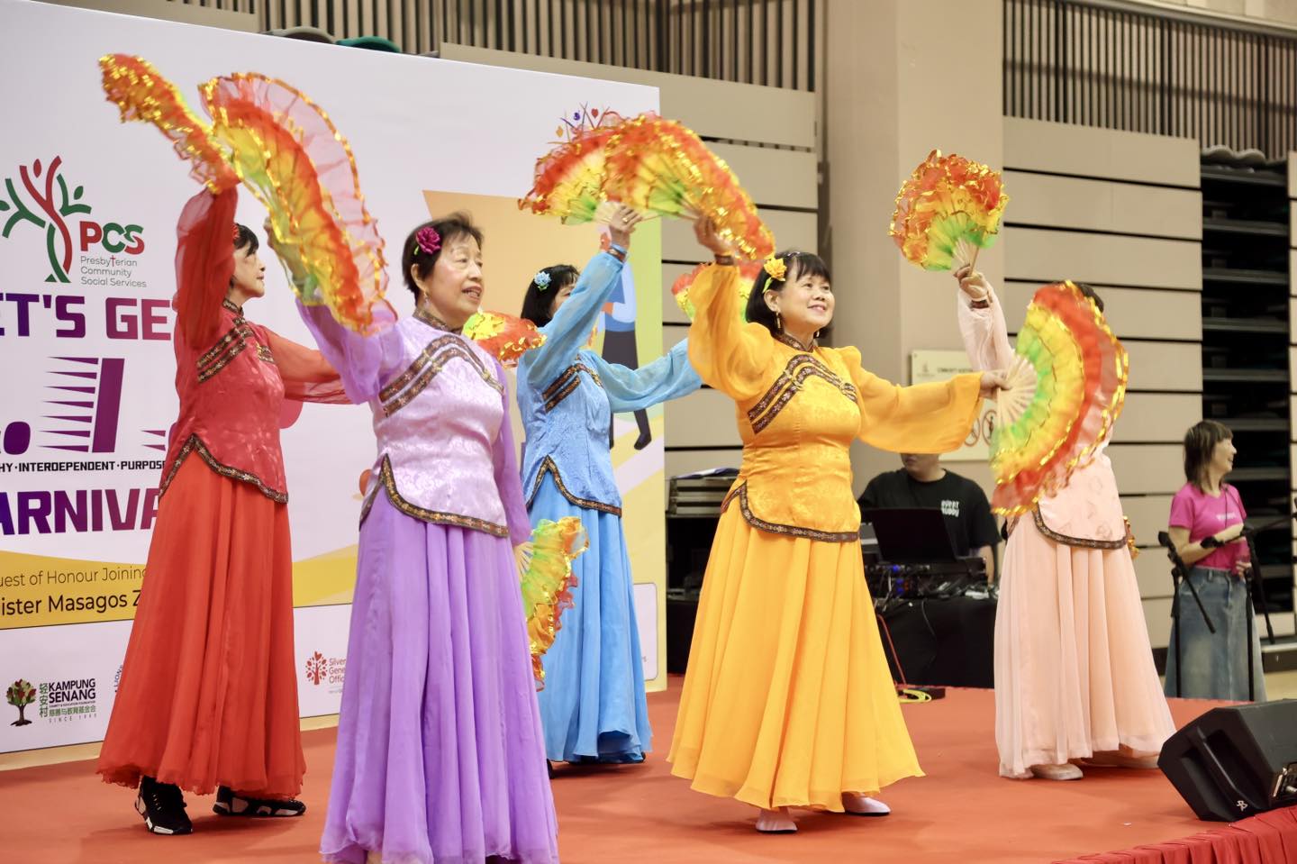 A lively concert taking place during the community celebration