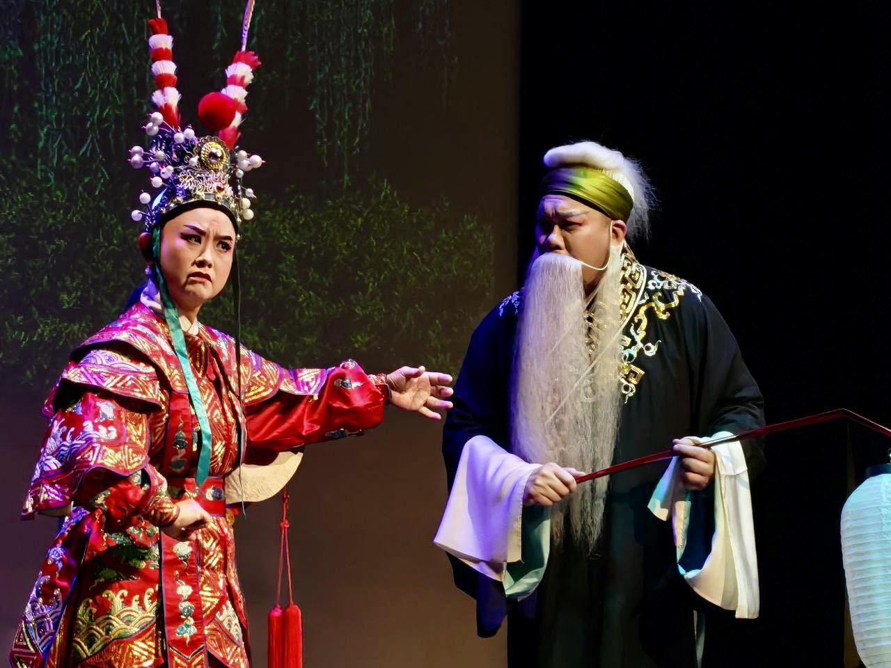 Teochew opera performers on stage in elaborate costumes during a performance at OTH.