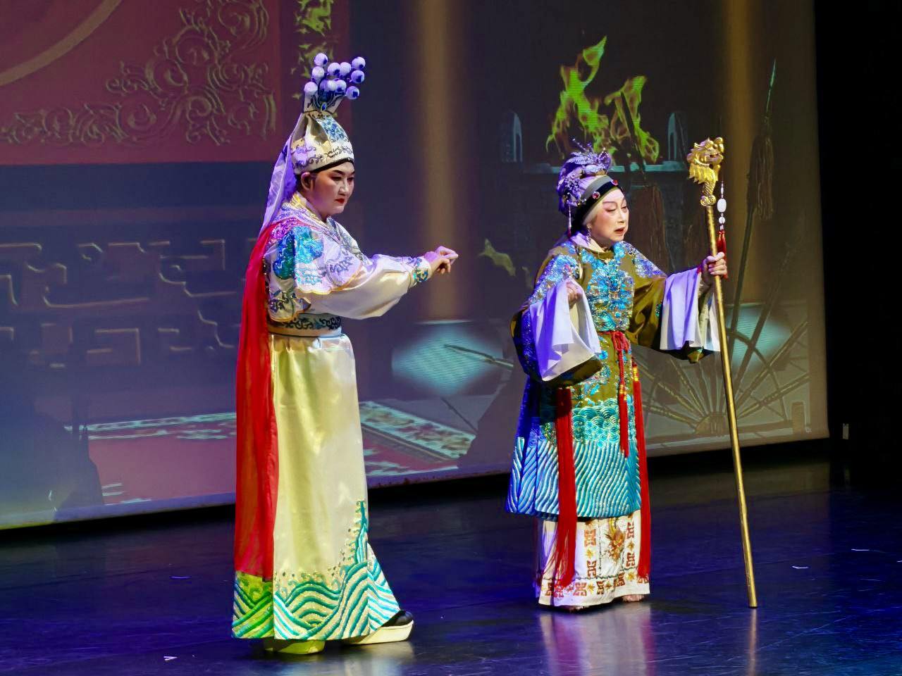 Audience members watching and enjoying a Teochew opera performance at the Festive Arts Theatre.