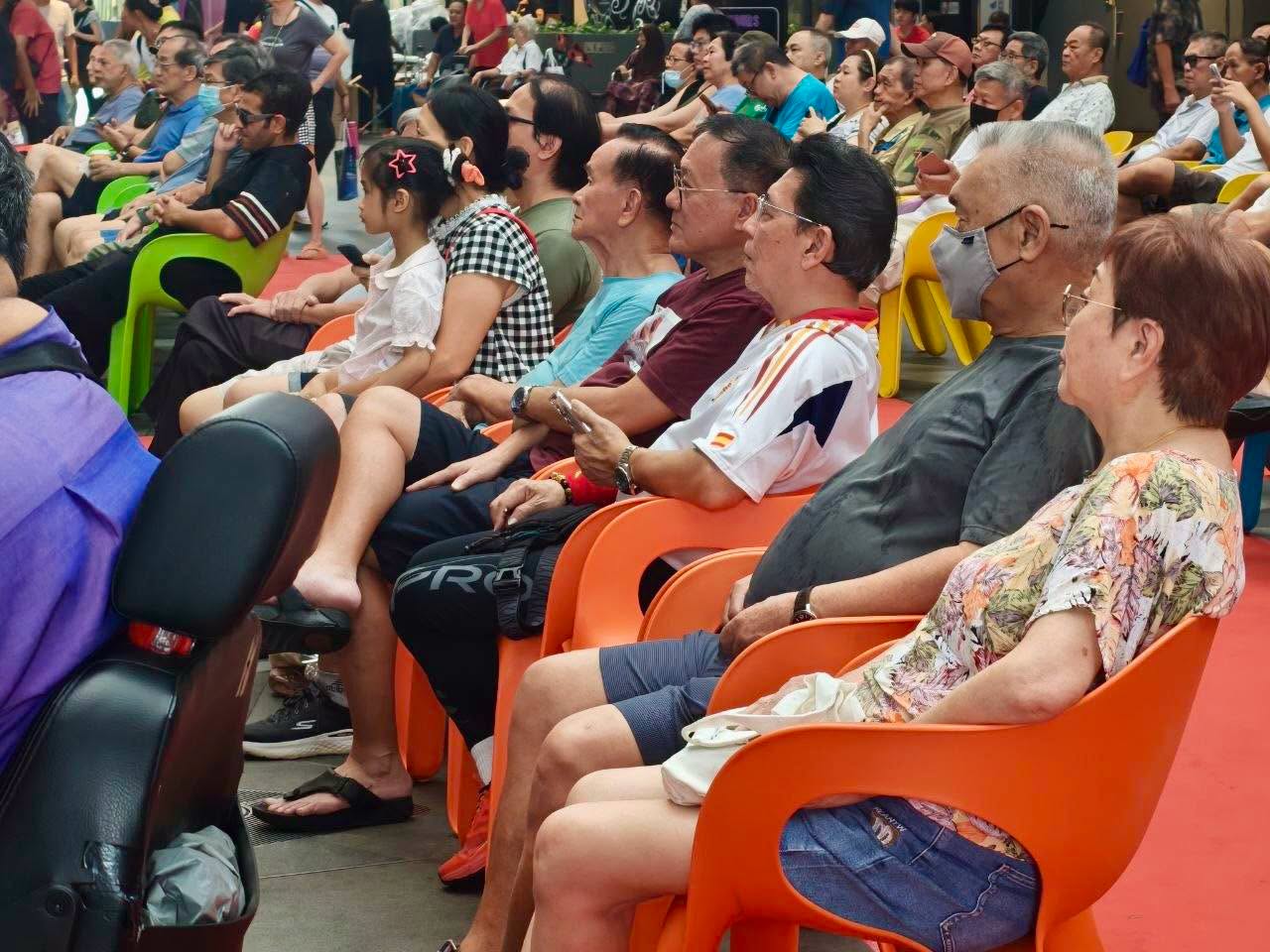 Audience seated at Our Tampines Hub outdoor area