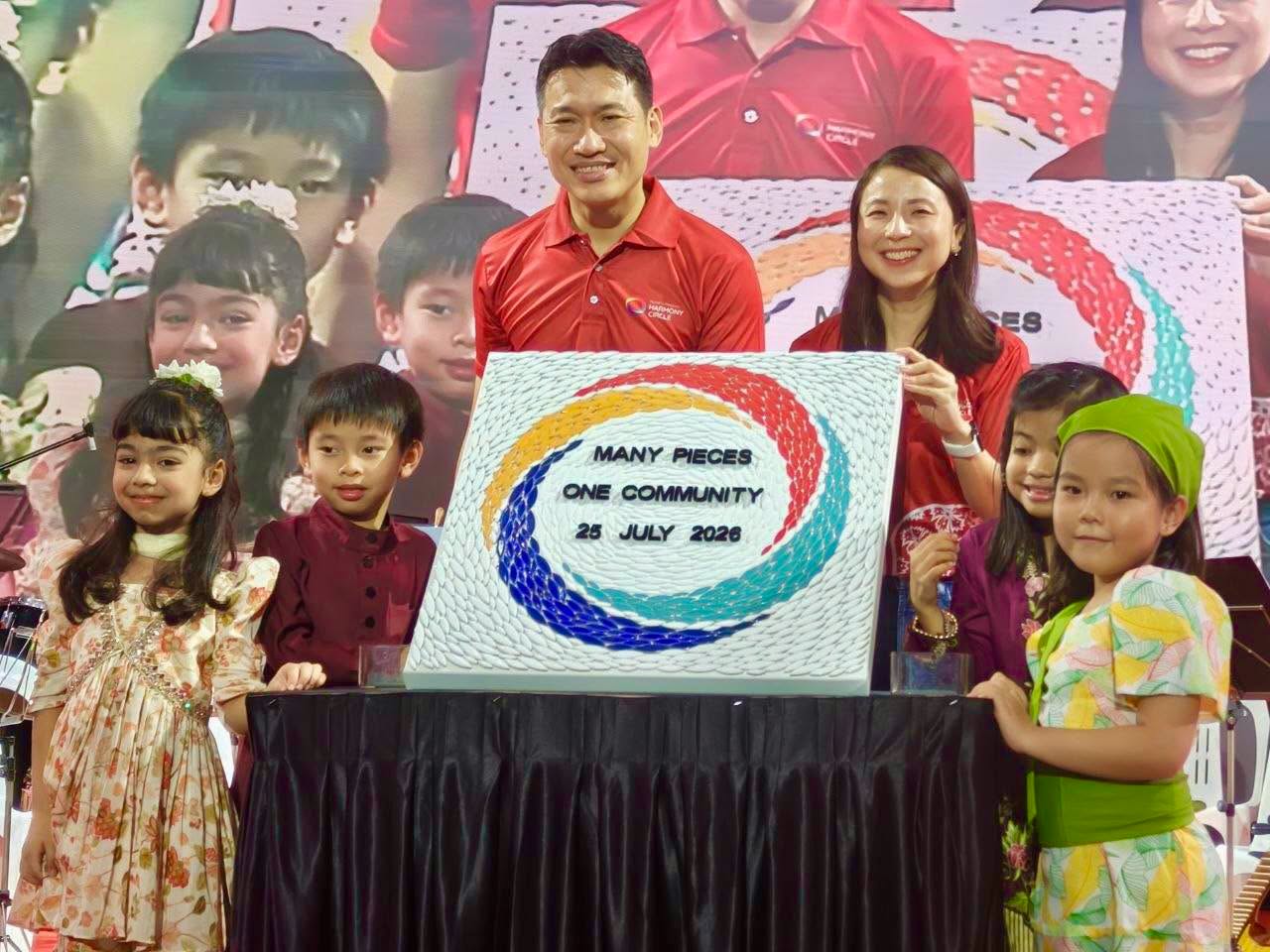 Many Pieces One Community cake at Tampines harmony event