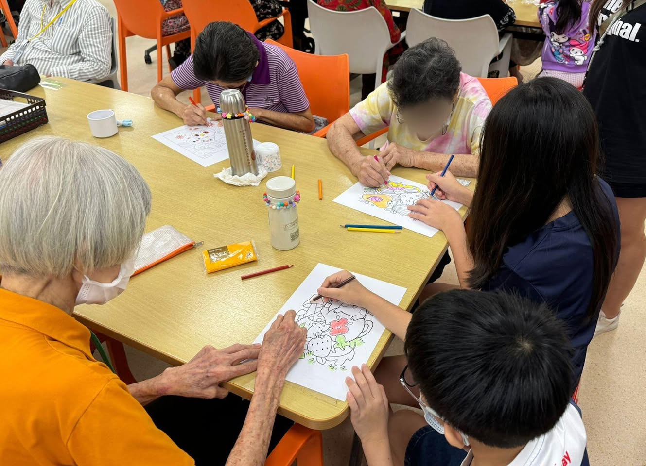 OTH Kids Club volunteers interacting with seniors