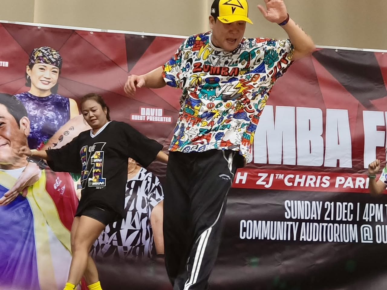 Participants smiling and dancing during the Zumba Masterclass.